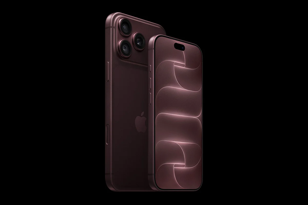 Mẫu iPhone 18 Pro Max màu đỏ mận với màn hình Dynamic Island và cụm ba camera trên nền đen