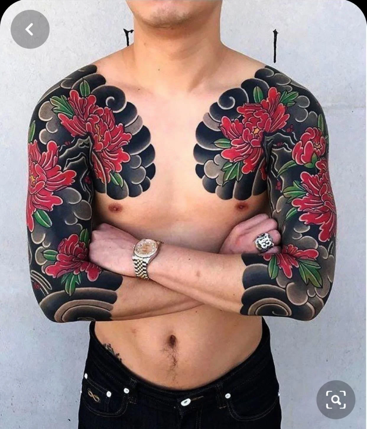 Hình xăm hoa mẫu đơn tay qua ngực
